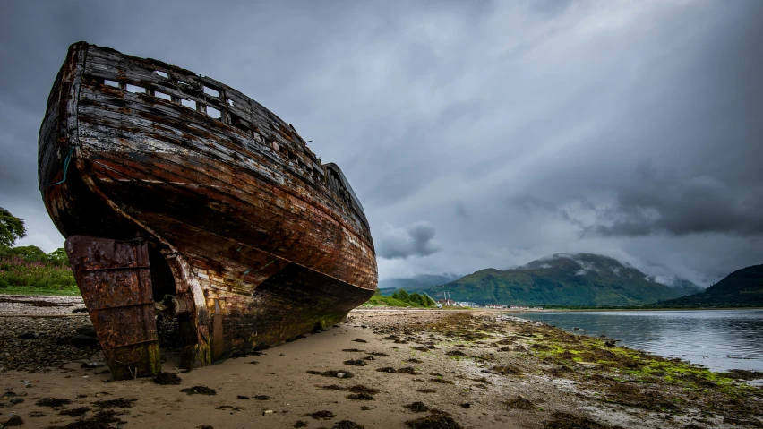 a large boat that is sitting in the sand