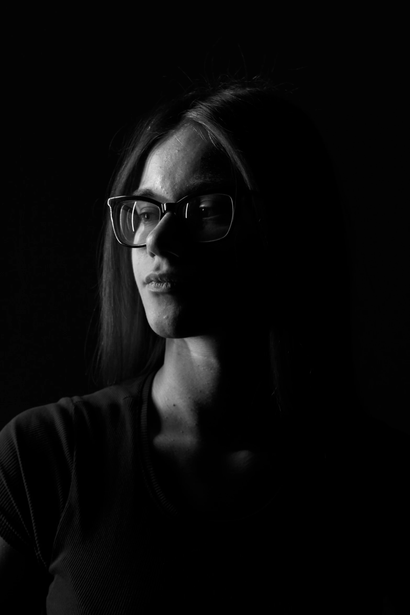 black and white pograph of woman wearing sunglasses