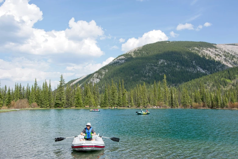 a person on a ski boat in the water