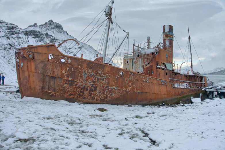 an old rusted boat that has been turned into a el