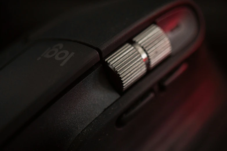 a close up of the black back of a computer mouse