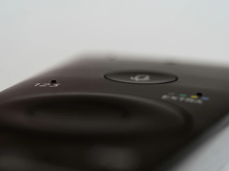 a close up s of the front side of a gray colored phone