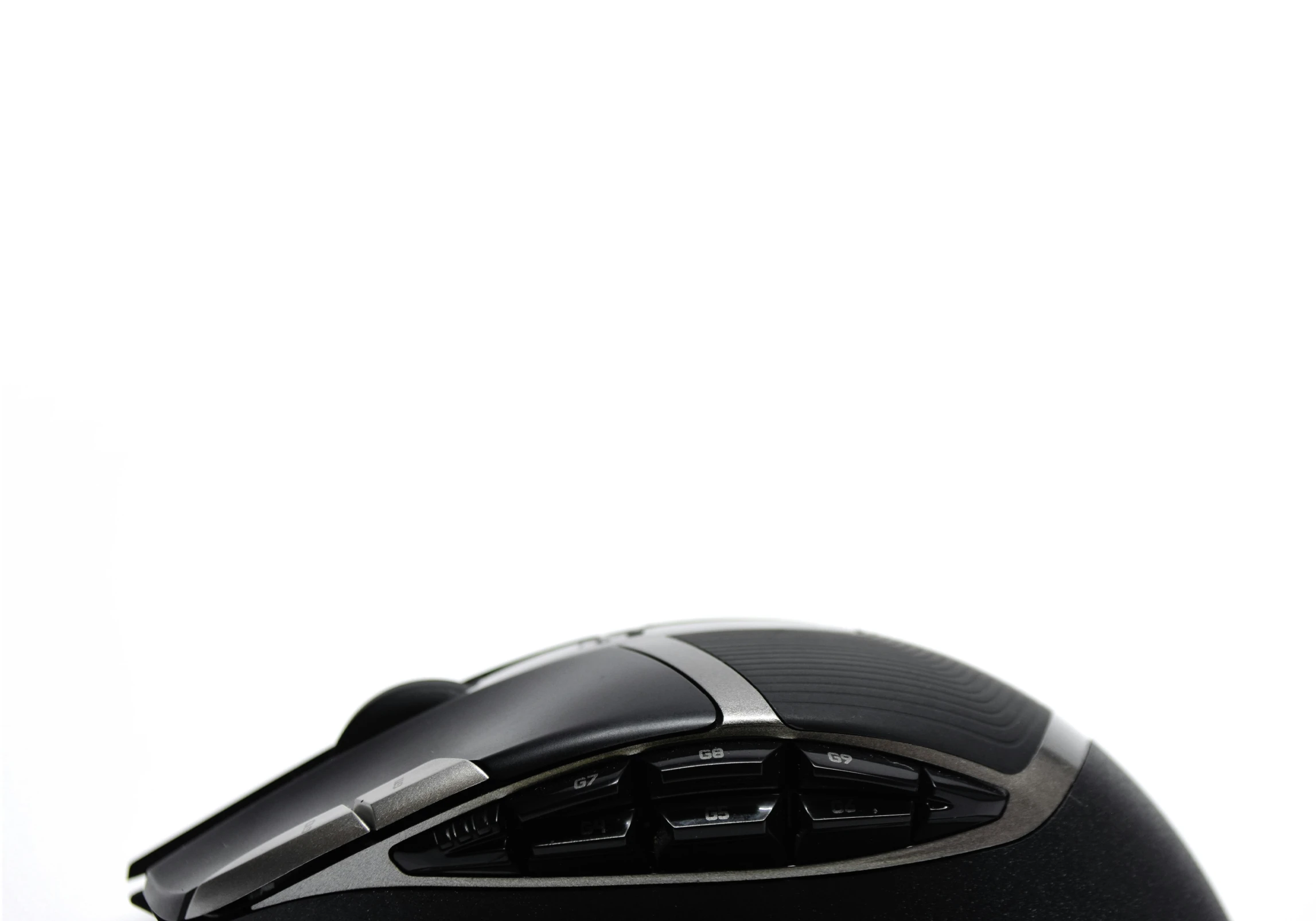 a black computer mouse sitting on top of a table