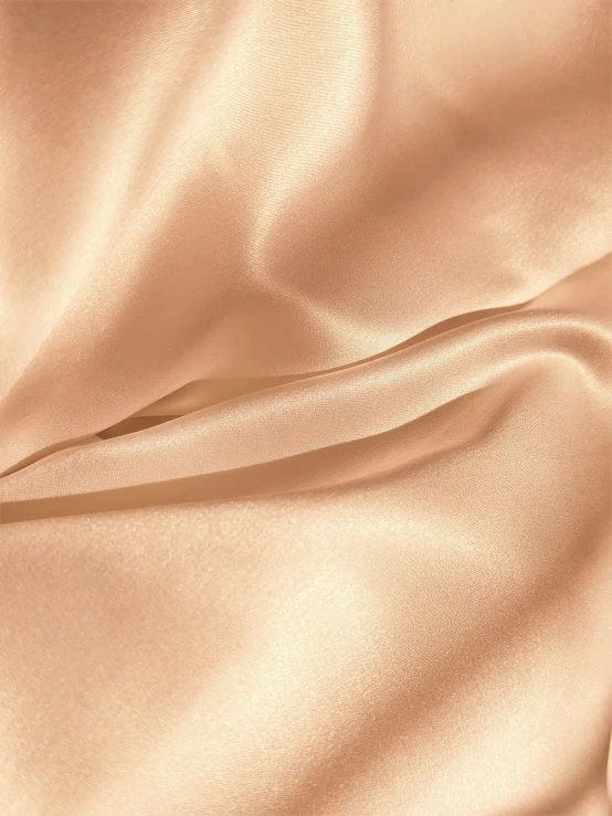 a textured golden silk fabric with slight folds