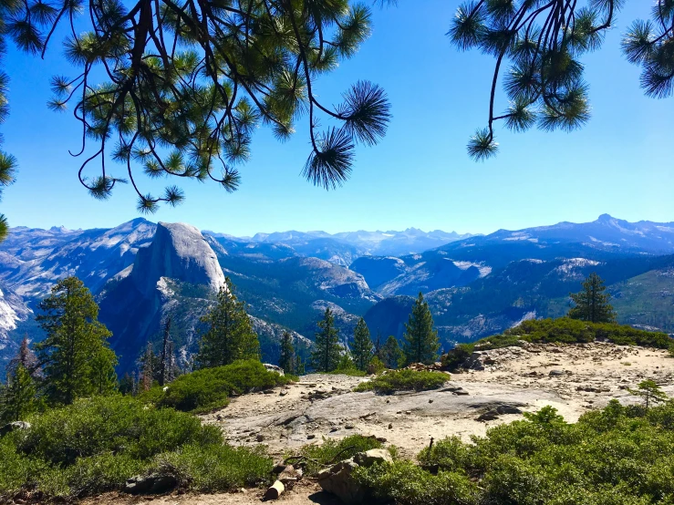 view from the top of a hill of mountains