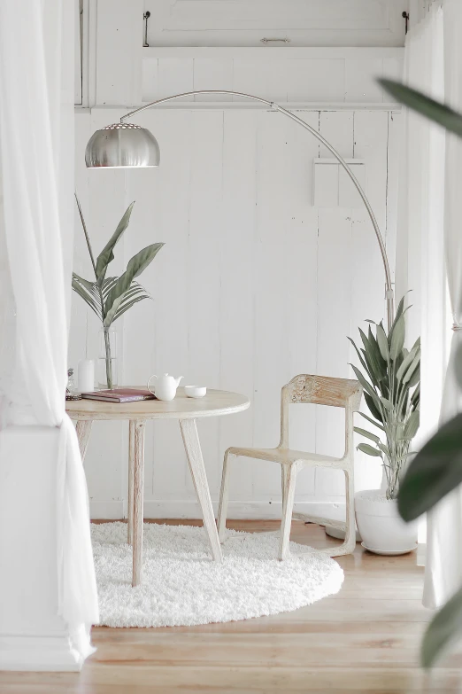 a room with white walls and white carpet