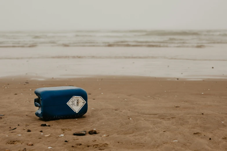 an open case is lying on the beach