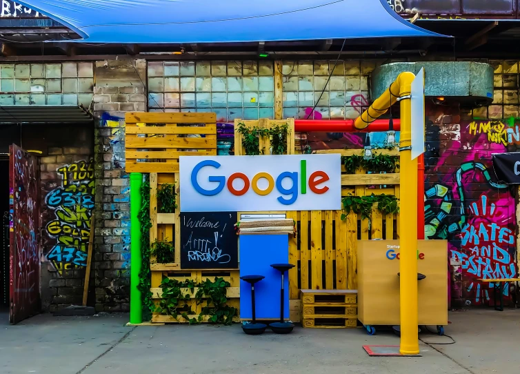 a yellow wooden rack with a google sign on it