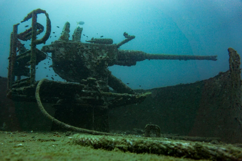 the engine of an old ship under water