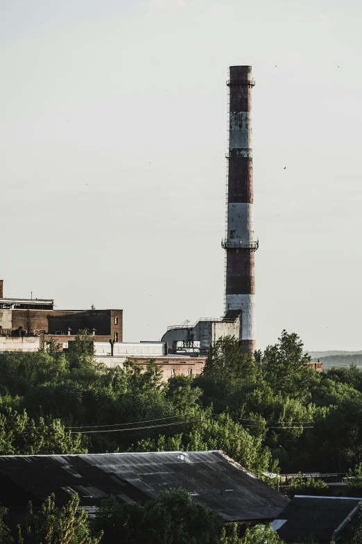 an industrial plant is shown in the distance