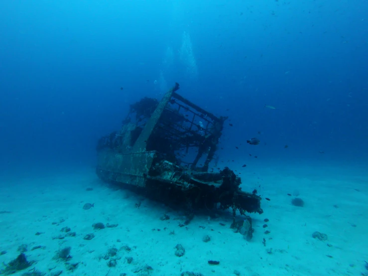 the bottom part of a large boat submerged in water