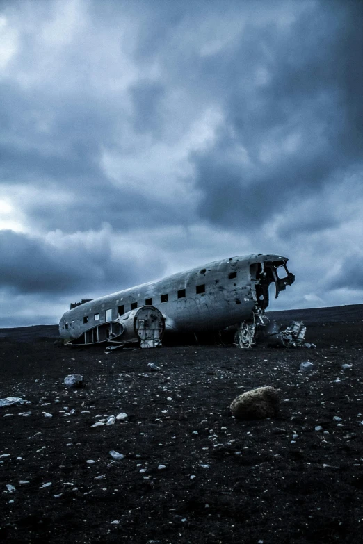 an airplane is sitting on the ground next to some trash