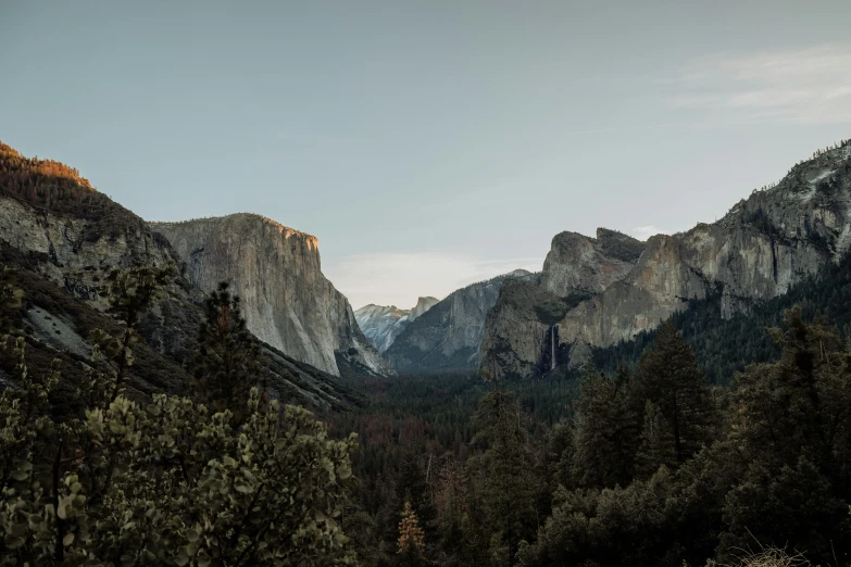 a couple of very tall mountains towering in the sky