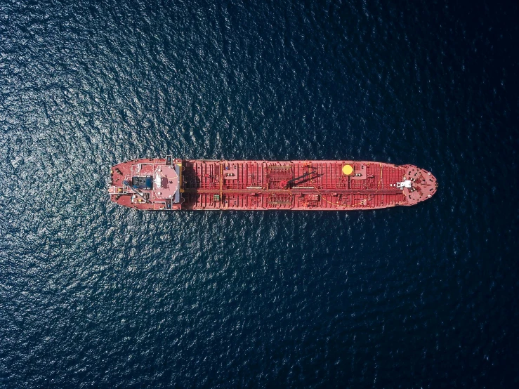 a boat in the ocean with it's top half down