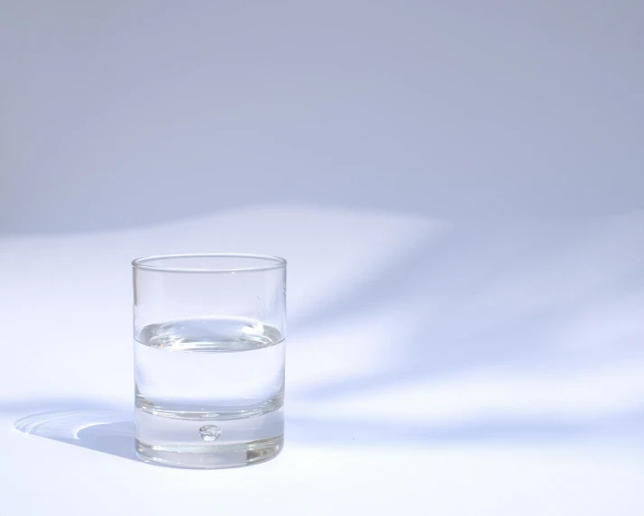 an empty glass is pictured with a white background