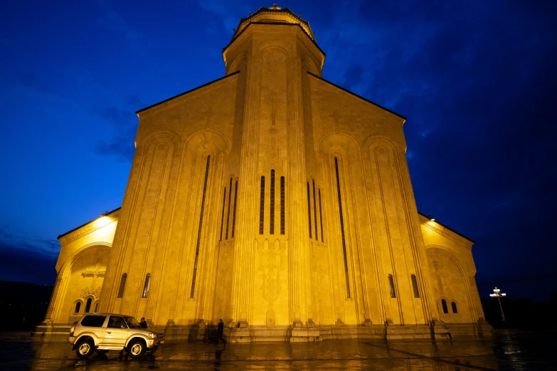 a large building with lights at night