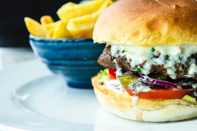 a burger with several different toppings on it