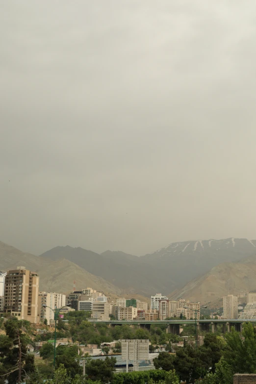 this po shows mountains and buildings in the background