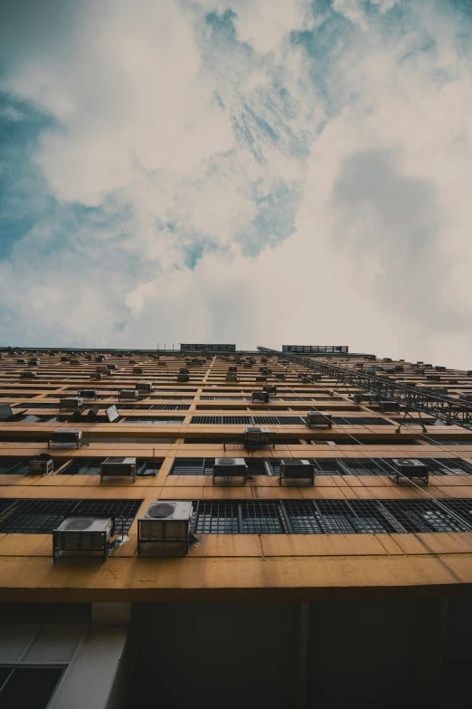 an upward view of the top part of a building