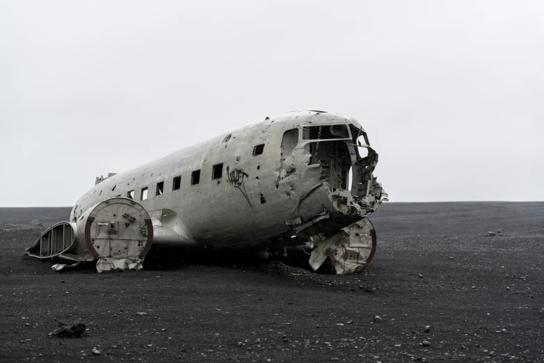 the remains of an airplane are left on the ground