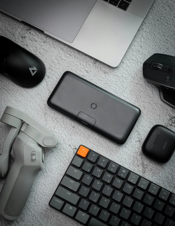 various electronic devices and mouse on the floor