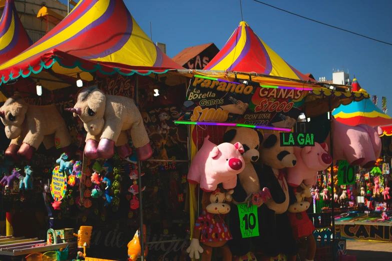 a carnival has large and small stuffed animals