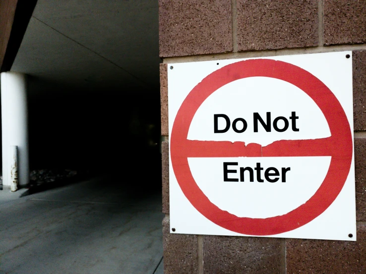 there is a sign saying do not enter on the wall