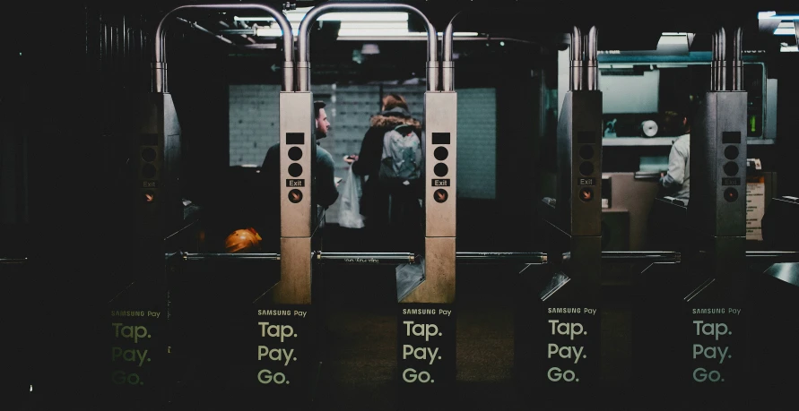 a couple standing at the exit to their train