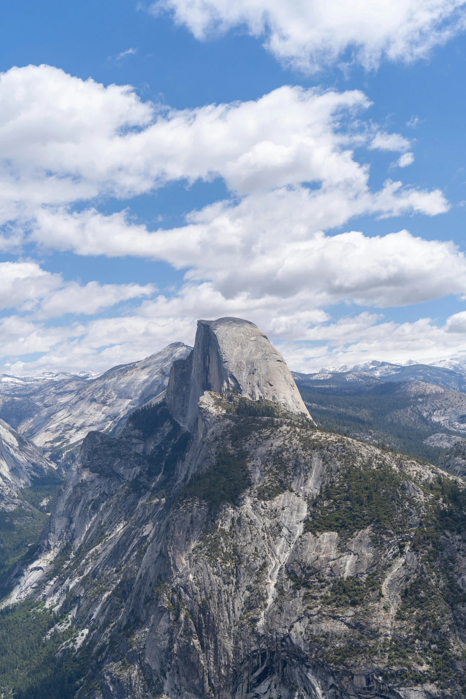 a mountain view is shown with mountains in the distance