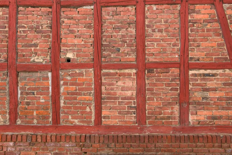 the top half of a wall made of brick