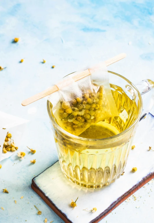 lemon and dried spices sit in an ice bucket