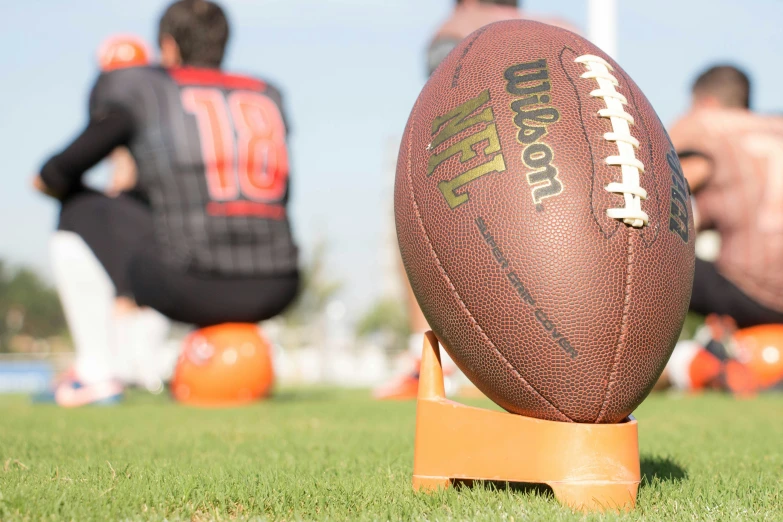 a close up of a football on top of a field