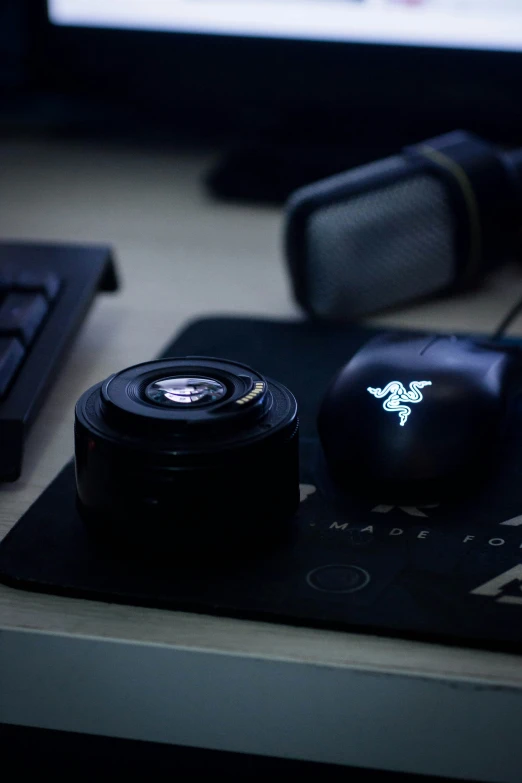 a computer keyboard and mouse sitting on a desk