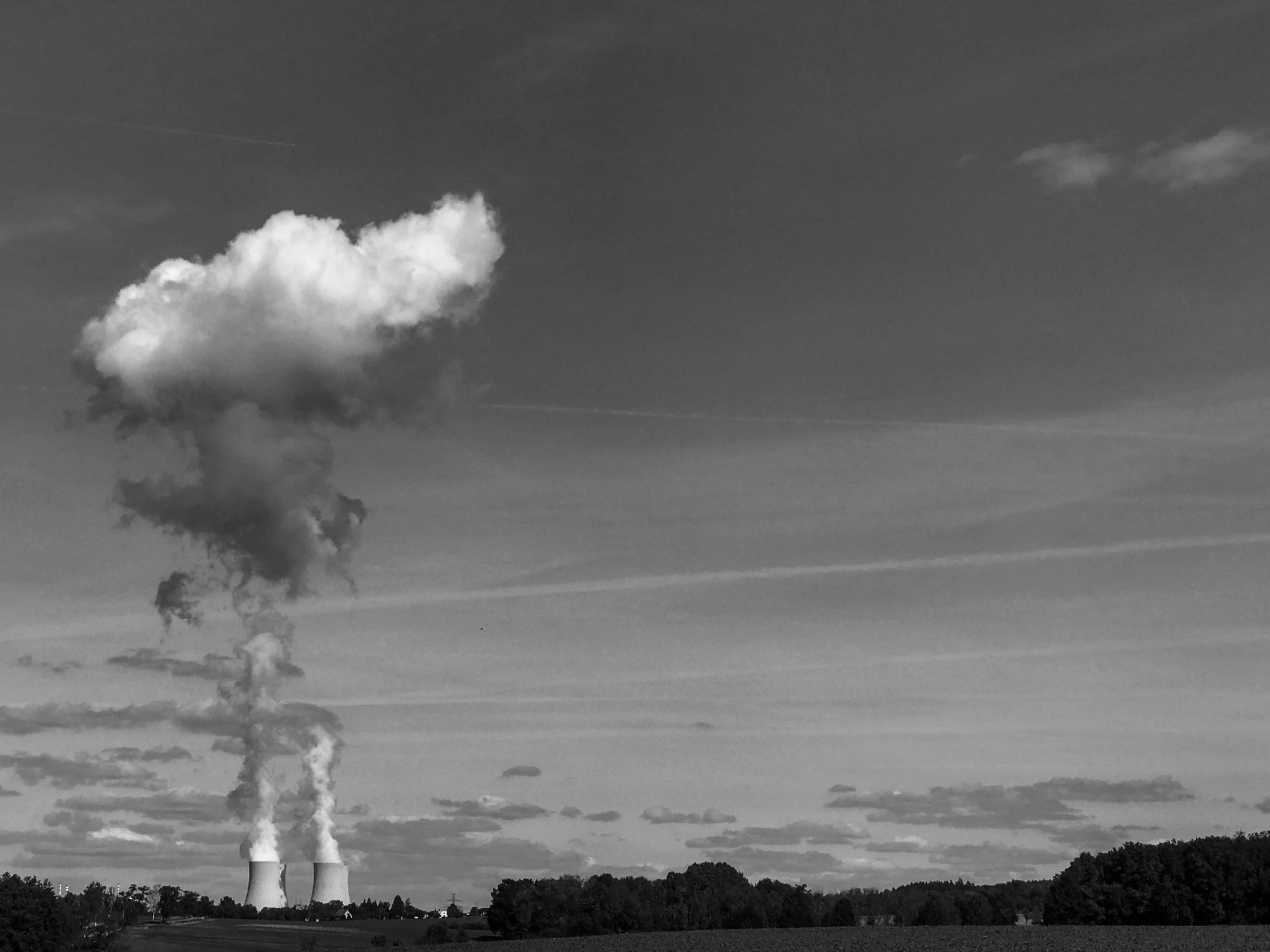 this is a po of a factory chimney in black and white