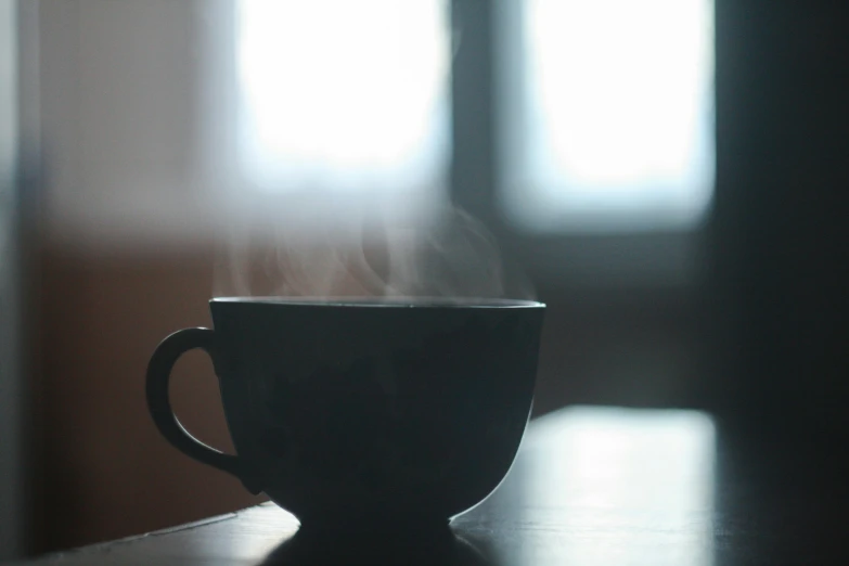  coffee cup with steam rising out of it
