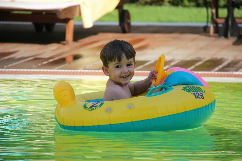 a  playing in an inner tube boat