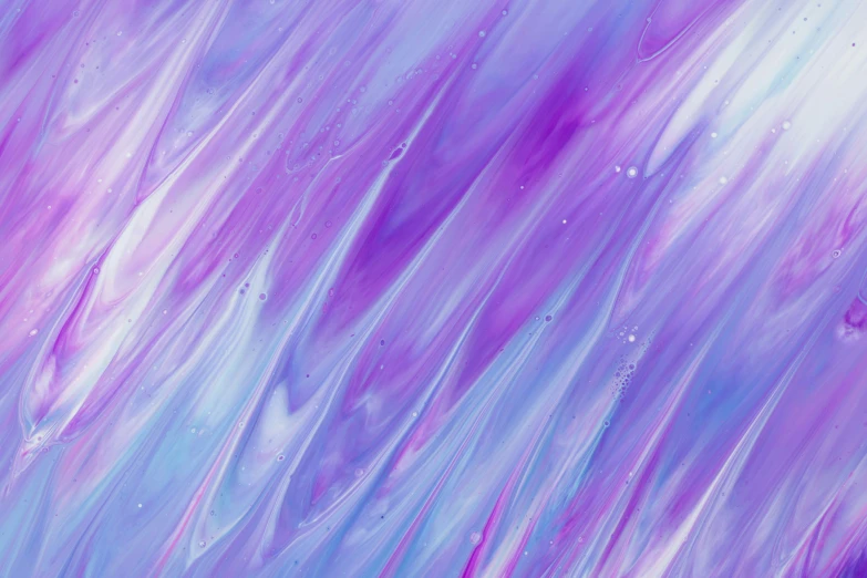 a background of pastel paint and water drops