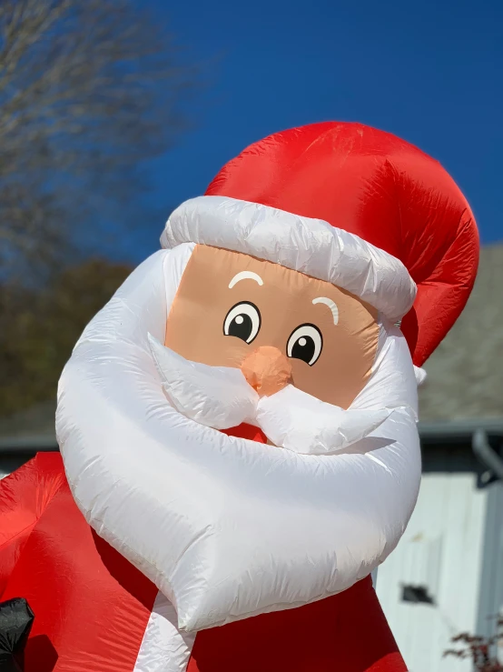 inflatable santa clause outside the front yard