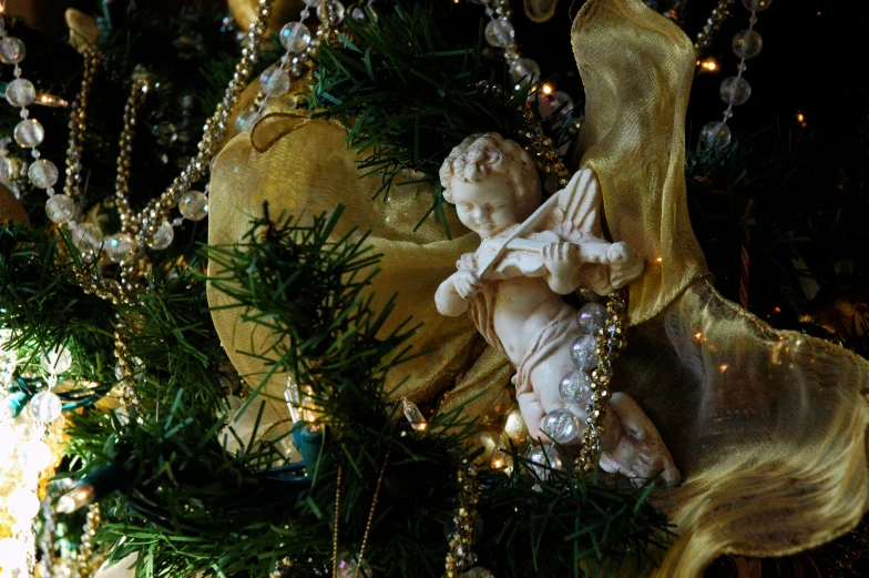 a close up view of decorations on the tree