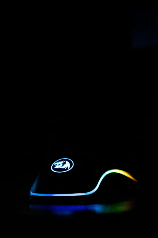 the back end of a lit up computer mouse