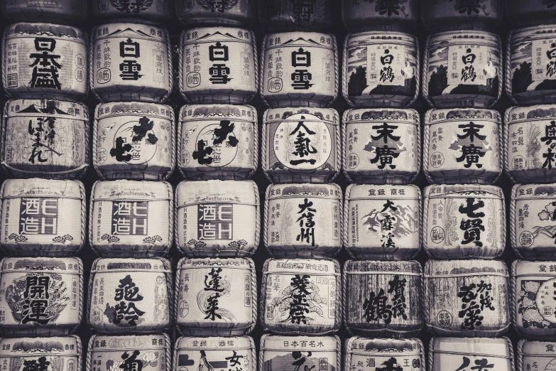 large jars with asian writing in each