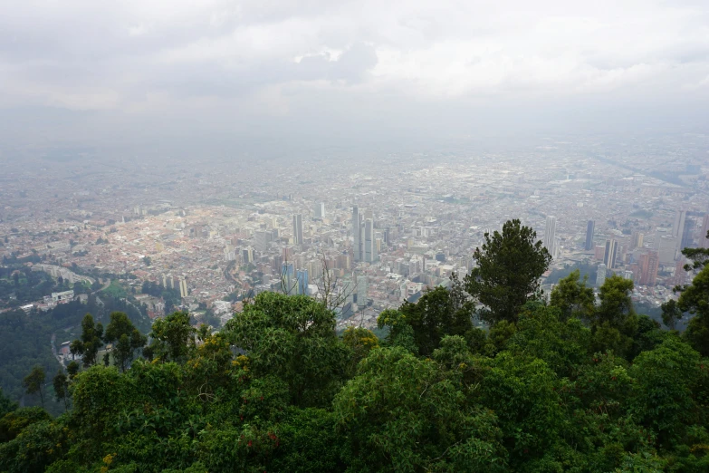 a view from a mountain top of city