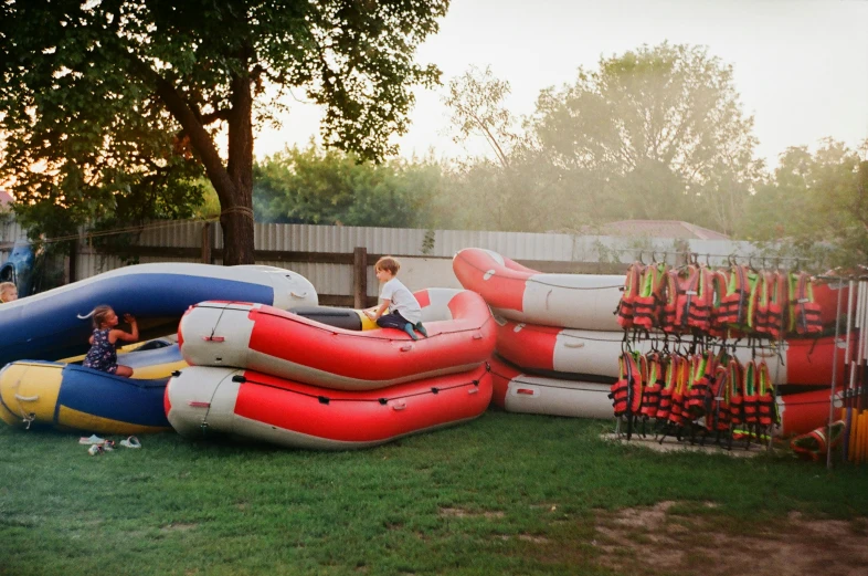 s play in inflatable boats at an event