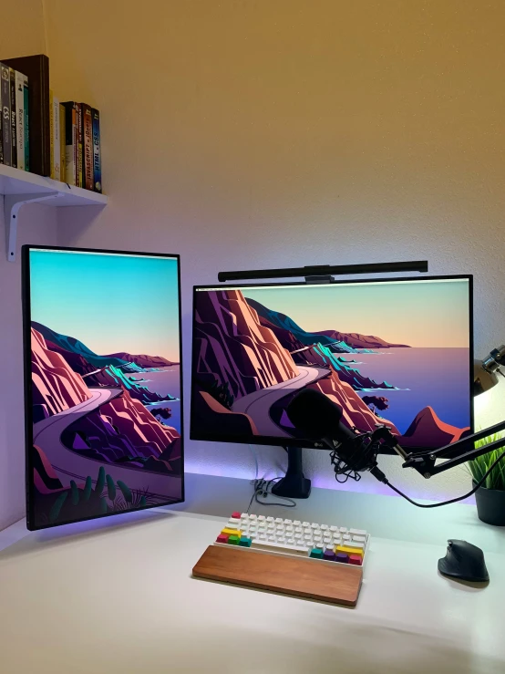 a computer and keyboard on a desk with some books