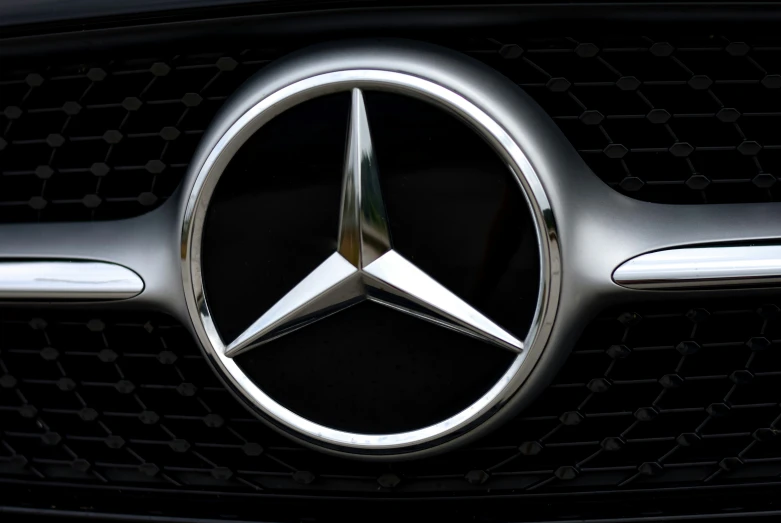 the logo of mercedes benz is displayed in the po