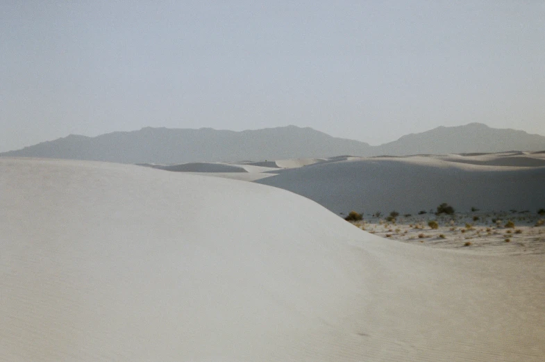 an uplift image of some mountains in the distance