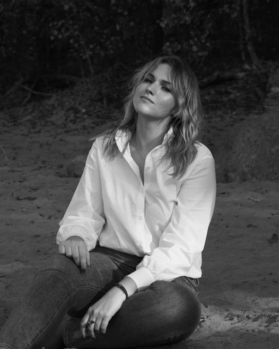 black and white pograph of a woman in an elegant shirt