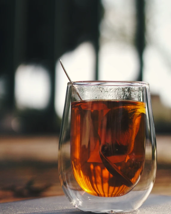 a closeup po of a tea inside of a glass