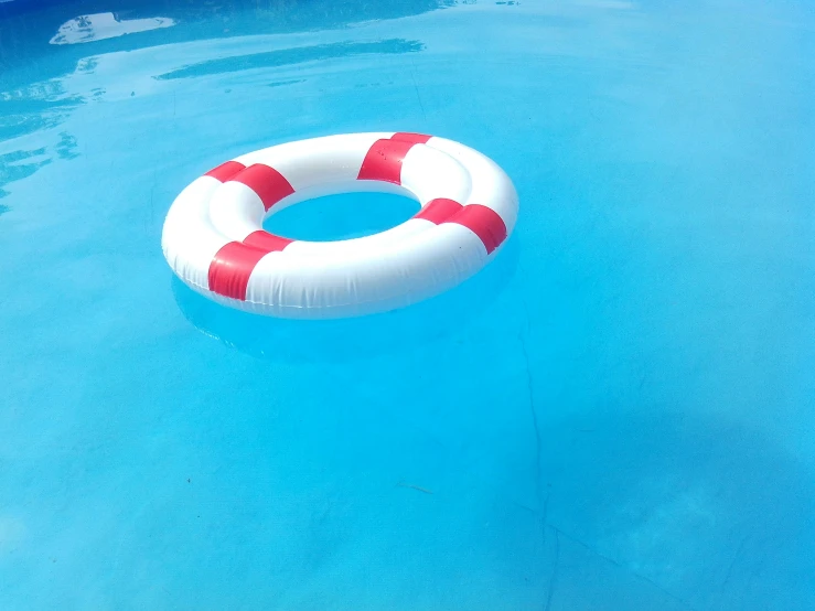 an image of a life ring in the pool