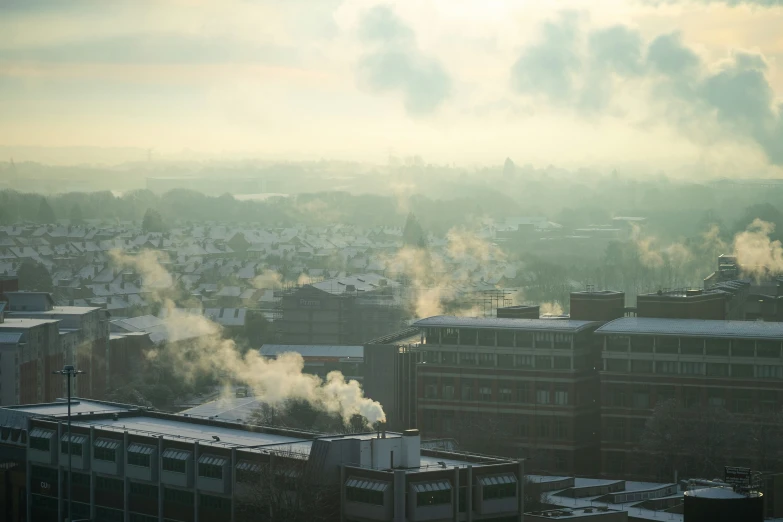 smoke rises from buildings while smogging smoke